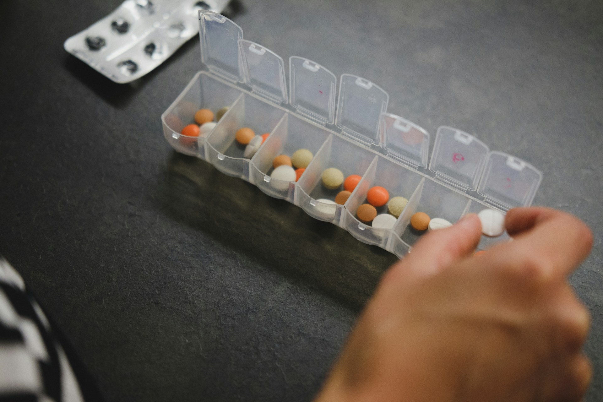 Person about to pick medicine